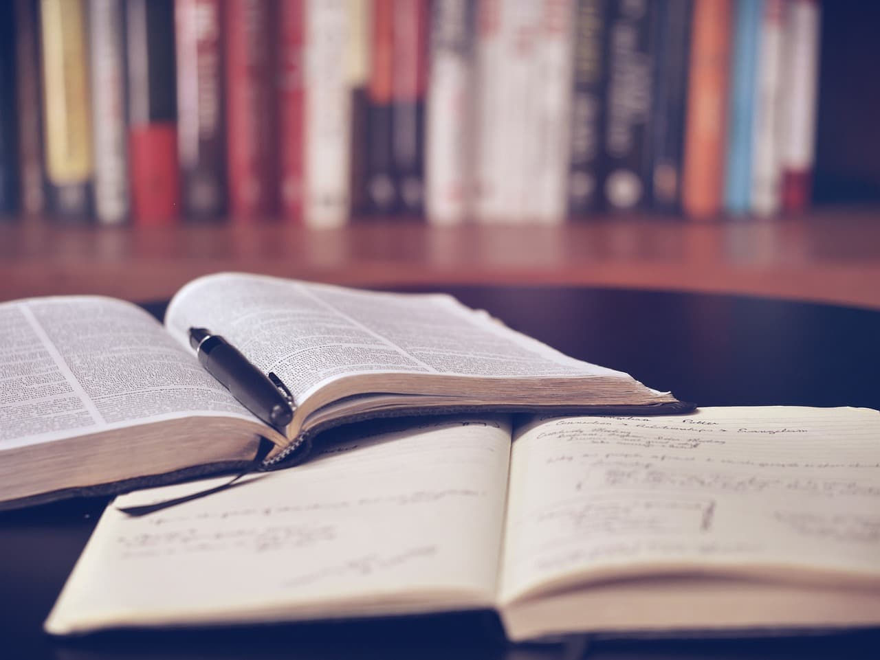 Open book representing the Xenvolt research library